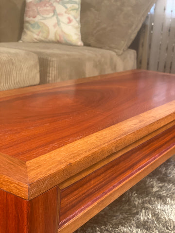 African cherry and paduka lift top coffee table